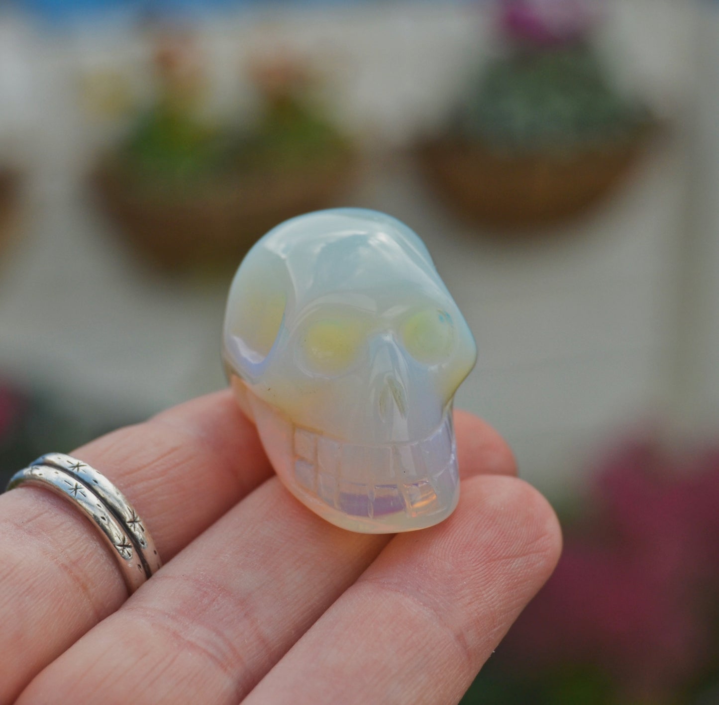 Carved Opalite Crystal Skull – Iridescent Healing Stone Decor and Collectible