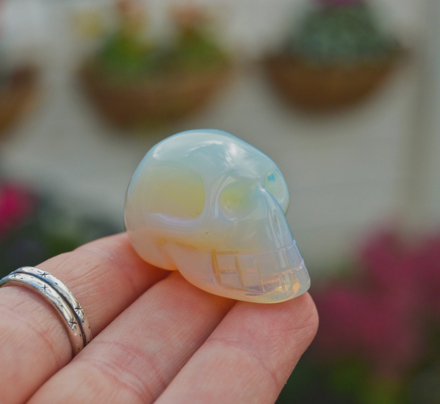Carved Opalite Crystal Skull – Iridescent Healing Stone Decor and Collectible